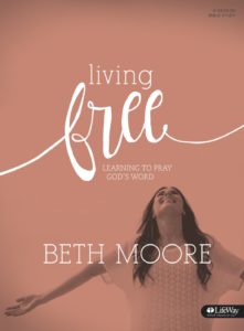cover of living free by beth moore pray god word