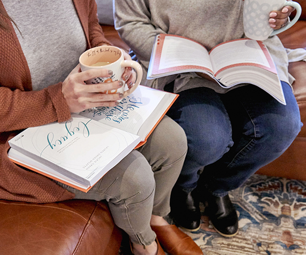 Women drinking coffee and doing a Bible study