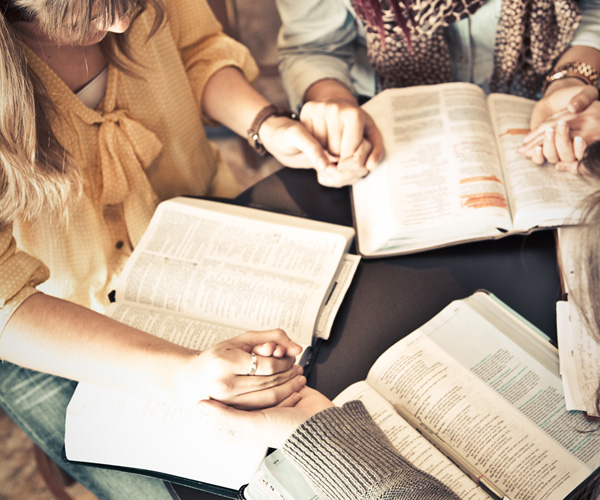 sisters in the faith studying the Bible