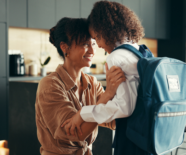 Woman praying for her child going back to school